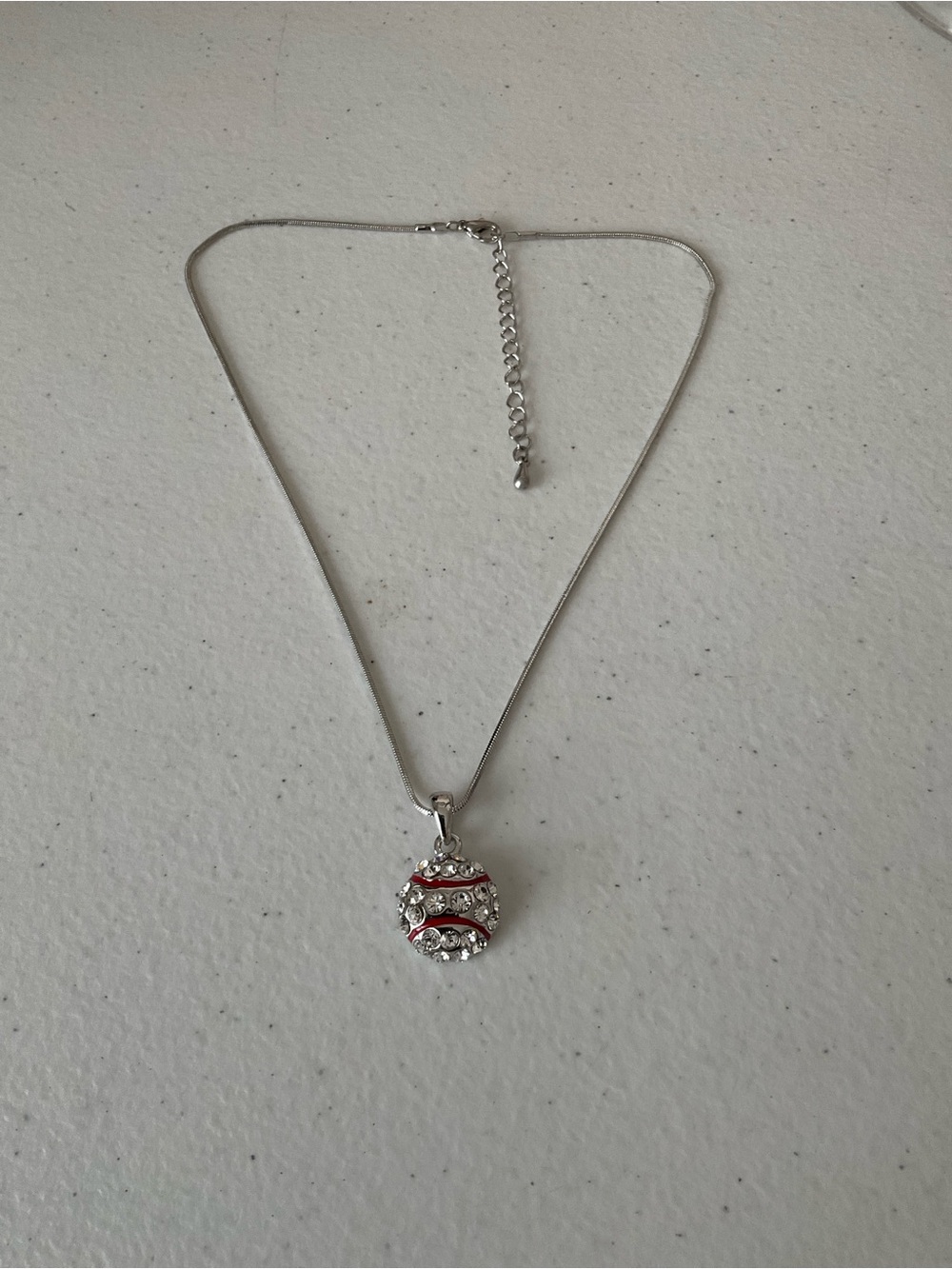 Silver Tone Necklace with Red and Clear Crystal Baseballs Pendant